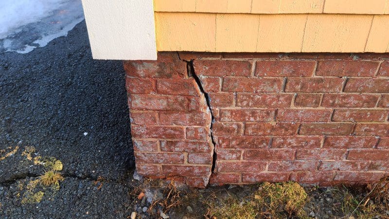 a crack in a house's foundation